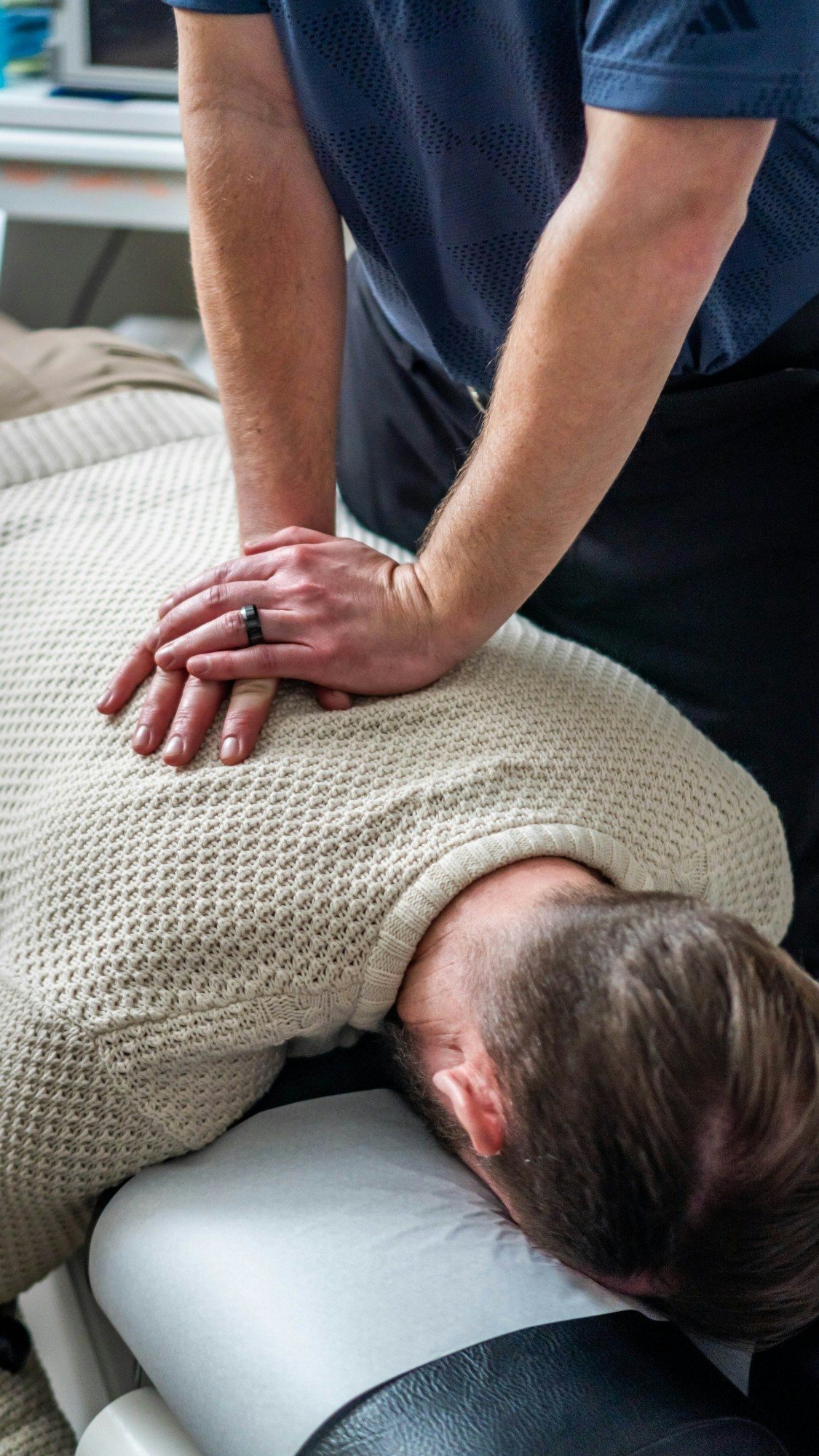 Chiropractor treating a patient