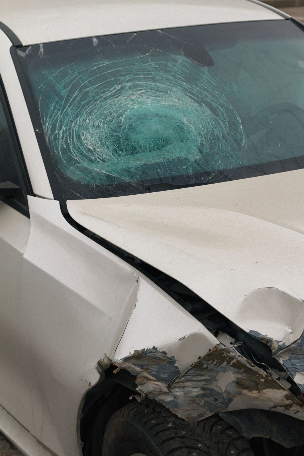 Damaged car with a shattered windshield